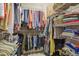 Walk-in closet offering generous storage with shelves and hanging rods at 1326 Apollo Beach S Blvd, Apollo Beach, FL 33572