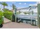 Private boat lift and dock perfect for the avid boater and enjoying waterfront living at 1326 Apollo Beach S Blvd, Apollo Beach, FL 33572