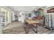 Spacious flex room with brewing and kitchen potential, wood-look floors and glass door at 1326 Apollo Beach S Blvd, Apollo Beach, FL 33572