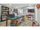 Spacious hobby room with a large work table, ample storage, and a view of the backyard at 1326 Apollo Beach S Blvd, Apollo Beach, FL 33572