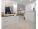 Charming butler pantry features custom cabinets, drawers, and countertop at 16 Hibiscus Rd, Belleair, FL 33756