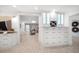 Charming butler pantry features custom cabinets, drawers, and wine rack at 16 Hibiscus Rd, Belleair, FL 33756