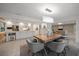 Open concept dining area adjacent to modern kitchen, perfect for gatherings at 16 Hibiscus Rd, Belleair, FL 33756