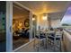 Balcony seating area offering a view of the interior and a scenic vista at 17900 Gulf Blvd # 1B, Redington Shores, FL 33708