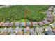 Aerial view of residential street, showing the back yards, and surrounding nature preserve behind the homes at 18203 Pine Hammock Blvd, Lutz, FL 33548