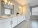 Bathroom featuring double vanity, granite countertops, and tile flooring at 18203 Pine Hammock Blvd, Lutz, FL 33548