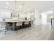Bright, modern kitchen with a spacious island and seating, perfect for entertaining at 18203 Pine Hammock Blvd, Lutz, FL 33548
