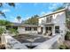 Spacious backyard with outdoor seating and a balcony at 1905 Pine Tree Ln, Belleair Bluffs, FL 33770