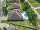 Beautiful property featuring a pool, large backyard, and a meticulously kept lawn at 21028 Ski Way, Land O Lakes, FL 34638