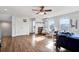 Spacious bedroom with natural light, wood flooring, a ceiling fan, and twin beds at 21028 Ski Way, Land O Lakes, FL 34638