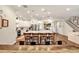 Bright kitchen features an island with seating and stainless steel appliances at 21028 Ski Way, Land O Lakes, FL 34638