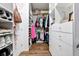 Organized walk-in closet with shelves, hanging racks, and drawers at 21028 Ski Way, Land O Lakes, FL 34638