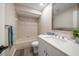 Updated bathroom features a tub shower combo and a modern quartz vanity top at 2170 Elm St # 906, Dunedin, FL 34698