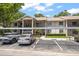 Exterior of a 2 story condo with covered parking at 2170 Elm St # 906, Dunedin, FL 34698
