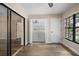 Home features a convenient laundry area with sliding glass doors and large window at 2170 Elm St # 906, Dunedin, FL 34698
