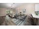 Open floor plan with dining room, living room, and breakfast bar creating an ideal space for entertaining at 2170 Elm St # 906, Dunedin, FL 34698