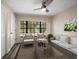 Cozy living room filled with natural light, stylish decor, and plush seating at 2170 Elm St # 906, Dunedin, FL 34698