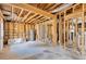 Unfinished basement featuring exposed wooden beams and utility fixtures at 219 80Th Ne Ave, St Petersburg, FL 33702