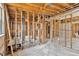 A bathroom with exposed framework and a partially installed toilet and bathtub at 219 80Th Ne Ave, St Petersburg, FL 33702
