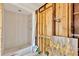 Bathroom with shower partially renovated; a blank canvas for customization at 219 80Th Ne Ave, St Petersburg, FL 33702