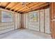 Bedroom showcasing exposed concrete walls and framework, awaiting personalization at 219 80Th Ne Ave, St Petersburg, FL 33702