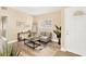 Cozy living room features modern flooring, neutral tones, stylish furnishings, and ample natural light at 219 80Th Ne Ave, St Petersburg, FL 33702