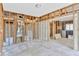 Spacious living room with exposed framework, offering potential for customization at 219 80Th Ne Ave, St Petersburg, FL 33702