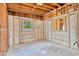 Room showcasing exposed concrete walls and framework, awaiting customization at 219 80Th Ne Ave, St Petersburg, FL 33702