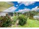 Lush backyard landscape and view of the waterway provide a peaceful outdoor retreat at 2324 Hayworth Rd, Port Charlotte, FL 33952