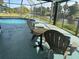 Screened-in patio with pool and canal views at 2324 Hayworth Rd, Port Charlotte, FL 33952
