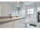 Bright bathroom with a shower/tub combo and plenty of cabinet space at 23420 Peachland Blvd, Port Charlotte, FL 33954