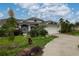 Charming single-story home with a well-manicured lawn and a two-car garage at 23420 Peachland Blvd, Port Charlotte, FL 33954