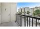 Balcony view overlooking community and tropical greenery at 2615 Cove Cay Dr # 409, Clearwater, FL 33760