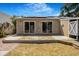 The backyard features a wood deck, brick path, and an out door shower at 2728 58Th S St, Gulfport, FL 33707