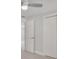 Bedroom featuring closet and updated flooring at 2728 58Th S St, Gulfport, FL 33707