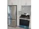 Bright kitchen with stainless steel appliances, including an LG refrigerator, and ample storage at 2728 58Th S St, Gulfport, FL 33707