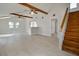 Bright living space boasts vaulted ceilings, wood beams, and a view of the modern updated kitchen at 2728 58Th S St, Gulfport, FL 33707