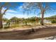 Picturesque pond view with mature landscaping and clear skies at 2728 58Th S St, Gulfport, FL 33707