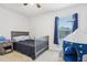 Well-lit bedroom with closet, window, and fun tent, creating a playful and inviting atmosphere at 3046 Donington Castle Ln, Land O Lakes, FL 34638