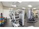 Fully equipped gym with modern exercise machines, weights, and mirrored walls for fitness enthusiasts at 3046 Donington Castle Ln, Land O Lakes, FL 34638