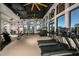 Well-equipped gym featuring treadmills, weights, and ample space for a complete fitness routine at 31350 Pendleton Landing Cir, Wesley Chapel, FL 33545