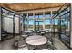 Bright lounge featuring stylish tables, unique chairs, and an inviting atmosphere at 31350 Pendleton Landing Cir, Wesley Chapel, FL 33545