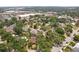 This home features an aerial view of a neighborhood with mature trees and surrounding community amenities at 3603 E Sterling Cir, Tampa, FL 33629