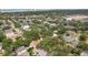 Aerial view highlighting a tree-lined neighborhood with easy highway access at 3603 E Sterling Cir, Tampa, FL 33629