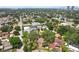 This home features an aerial view of a neighborhood with contemporary homes, mature trees, and easy access to city amenities at 3603 E Sterling Cir, Tampa, FL 33629