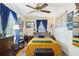 Comfortable bedroom with a cozy bed, blue accents, and stylish decor, offering a relaxing retreat at 3603 E Sterling Cir, Tampa, FL 33629