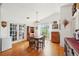 Bright dining room featuring hardwood floors, natural light and ample space at 3603 E Sterling Cir, Tampa, FL 33629