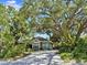 Charming single-story home with lush landscaping and a paved driveway, offering a serene and inviting curb appeal at 3603 E Sterling Cir, Tampa, FL 33629