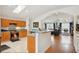 Bright kitchen features a breakfast bar, tile flooring, and modern stainless steel appliances at 3603 E Sterling Cir, Tampa, FL 33629