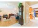 Spacious living room featuring hardwood floors, an antique clock, and abundant natural light at 3714 Village Estates Pl, Tampa, FL 33618